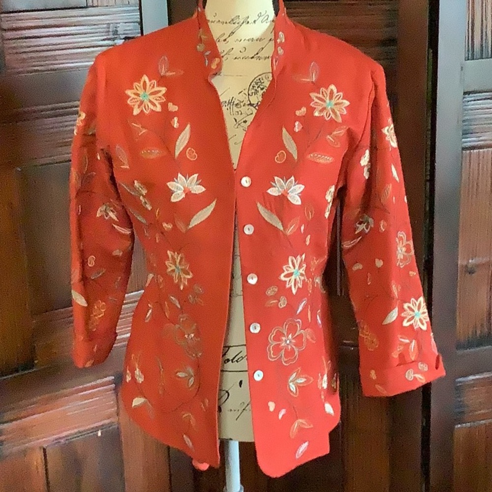 Red floral designed jacket. Great for summer.